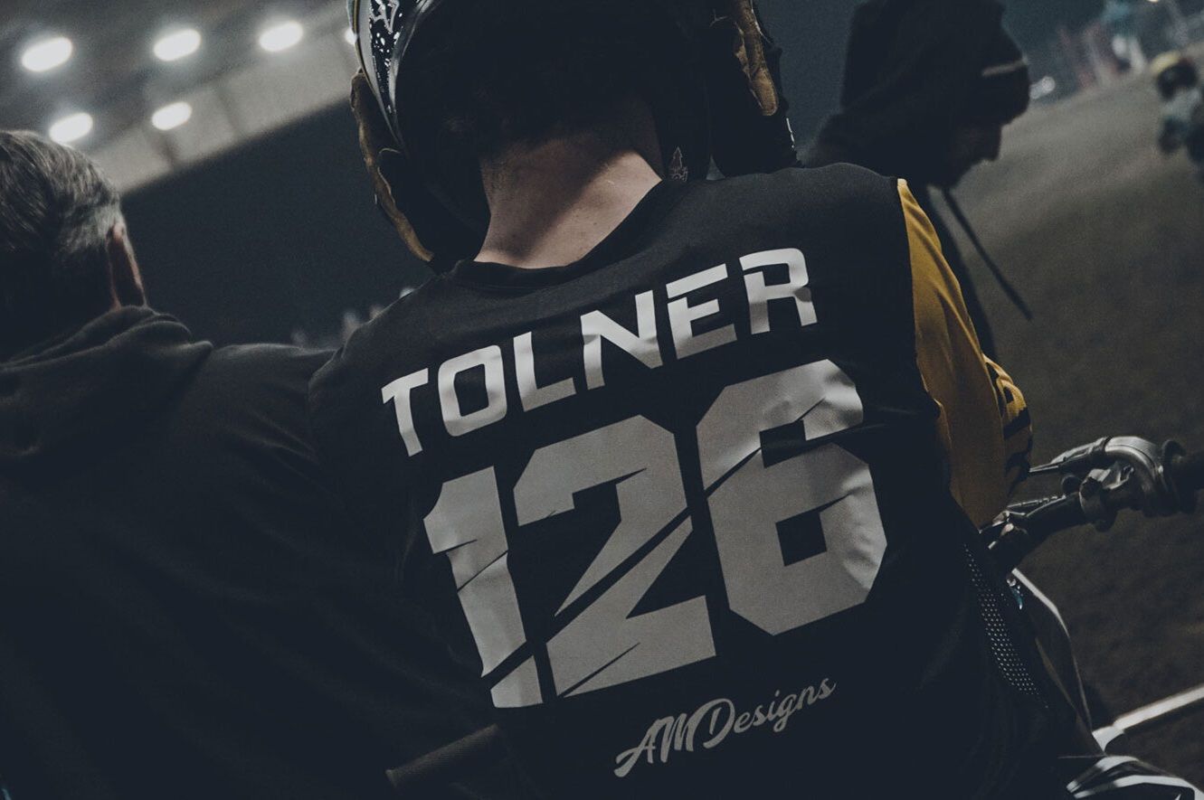 Jersey Category Image Man on Motocross Bike with Jersey that reads "Tolner 126 AMDesigns"
